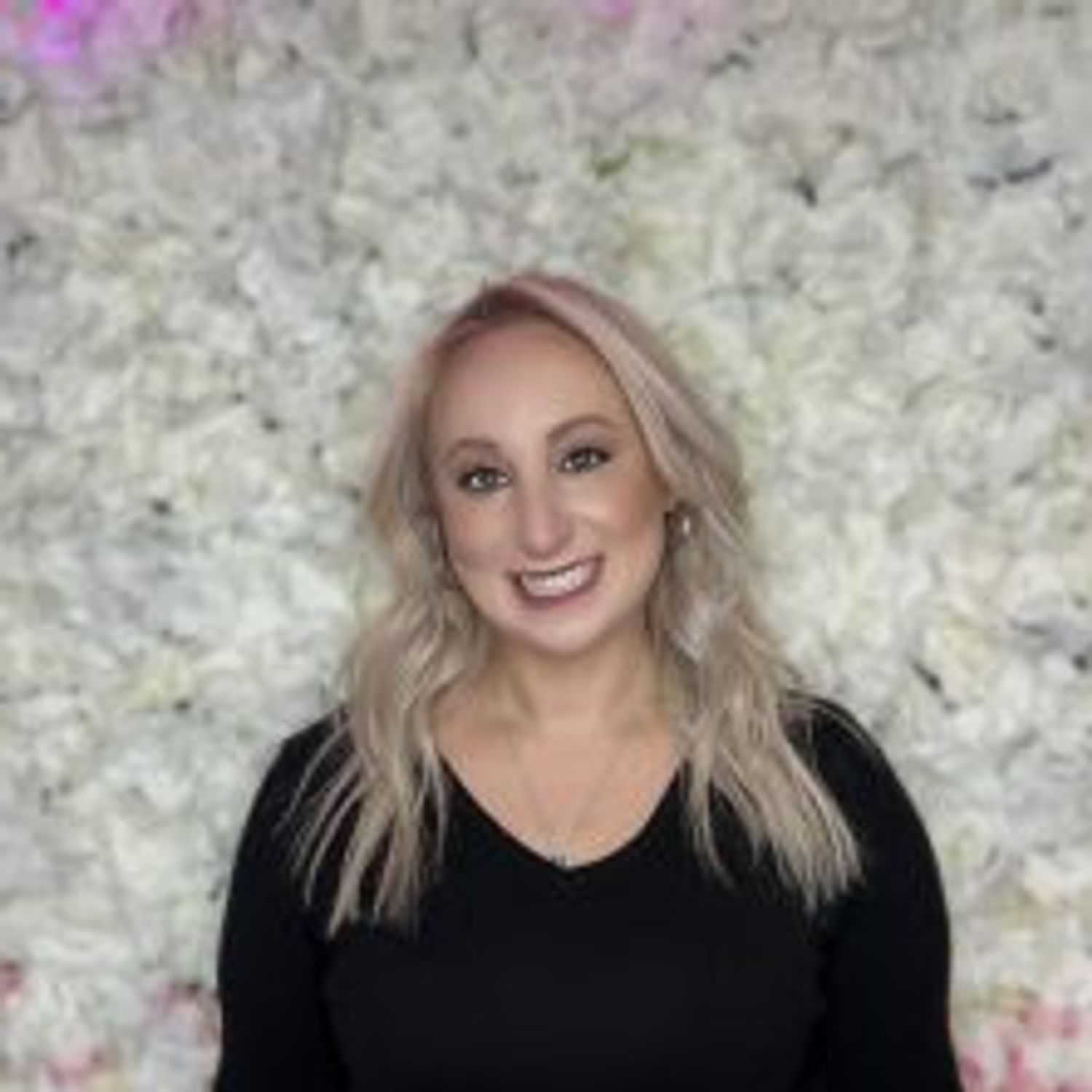 Portrait of Marissa Fernandez, a professional stylist at The Hair Bar, showcasing their expertise and style.