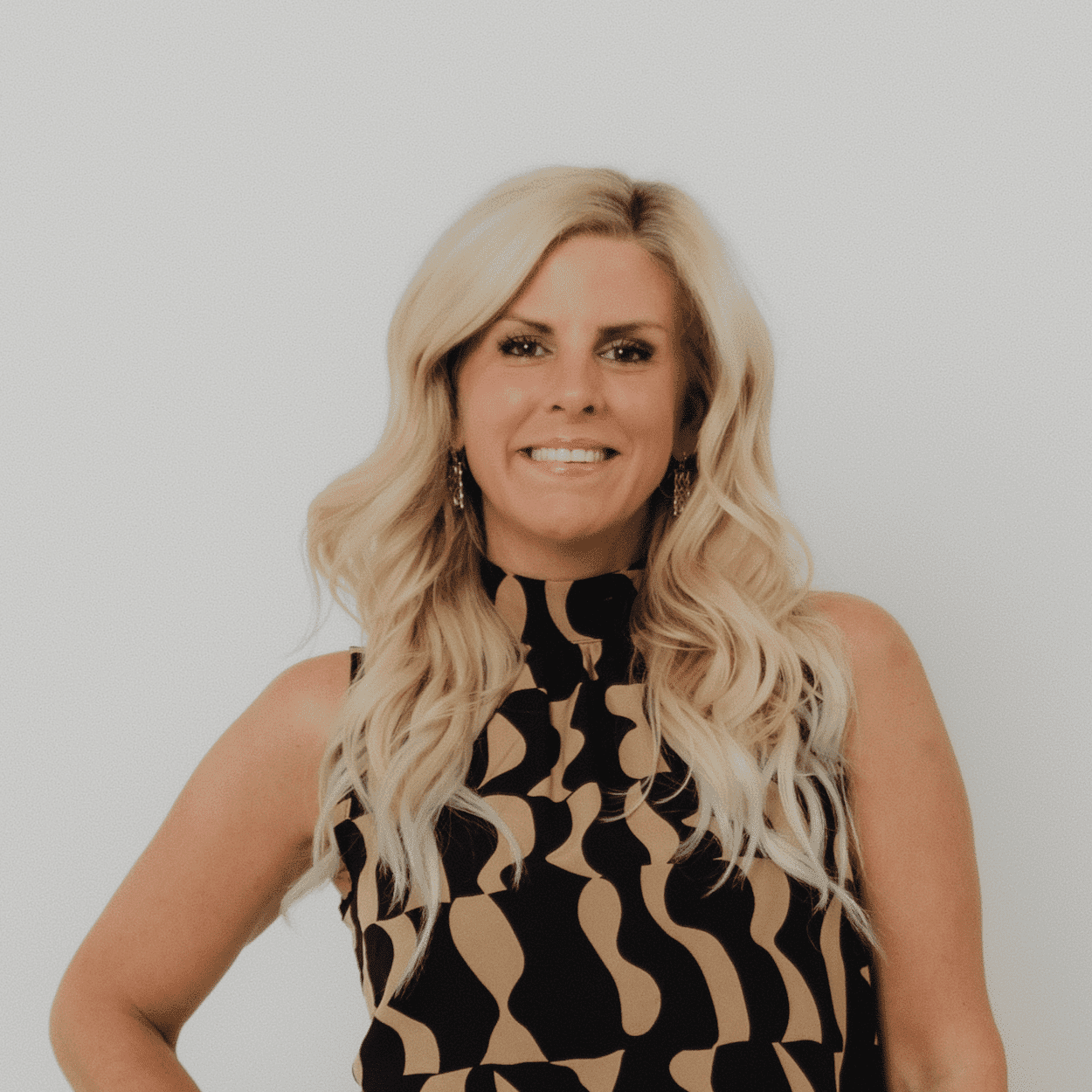 Portrait of Marla Cafarella, a professional stylist at The Hair Bar, showcasing their expertise and style.